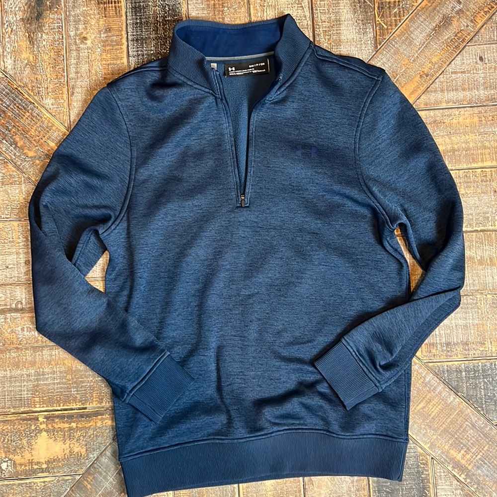 Under Armour blue pull-over. Small.
